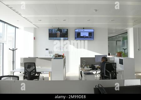 Journalists at work in the new modern editorial board of the financial's newspaper Il Sole 24 Ore, in Milan. Stock Photo