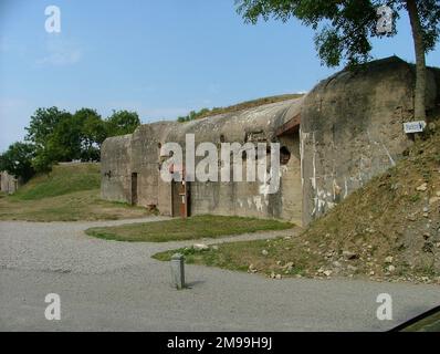 This was one of the first parts of the 'Atlantic Wall' to be constructed. There are four casemates 30 metres apart linked by 300 metres of concrete trenches. Following the landings the position held out until 9 June when it was taken by the US 22nd Infantry in an action in which Private Ralph Riley won the Silver Star. Stock Photo