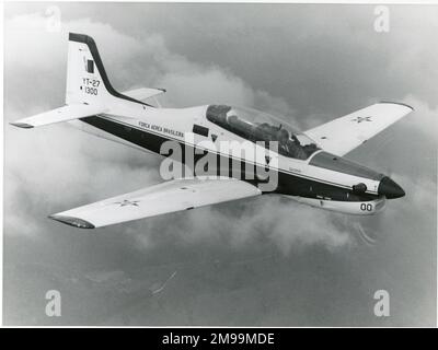 Brazilian Air Force Embraer EMB-312 Tucano in flight (YT-27 1300). Embraer S.A. is a Brazilian aerospace conglomerate that produces commercial, military, executive and agricultural aircraft and provides aeronautical services. Stock Photo