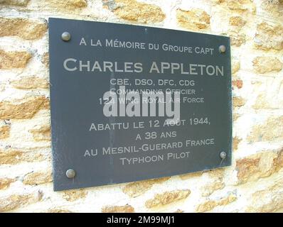 Appleton was educated at Malvern College and joined the Royal Air Force in the late 1920s. He saw action from the beginning of the war, hence his impressive collection of decorations. He was killed on 12 August 1944 at Le Mesnil-Guerard while Commanding 124 Wing and is buried at Banneville-la-Campagne Commonwealth War Graves Cemetery. Although it does not say so, this was probably put up by the 'Wings over Normandy Association'. Stock Photo