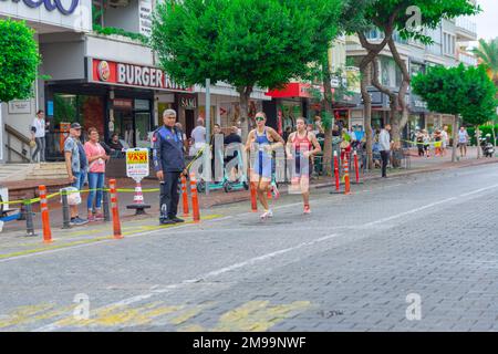 Alanya, Turkey, 16.10.2022: Women athletes from different countries run a marathon through the streets of the city of Alanya in Turkey. 2022 Europe Tr Stock Photo