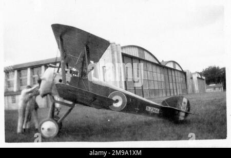 RNAS - Fleet Air Arm Sopwith 2F.1 Camel N7366 being started prior to flight.This photo of a Ships Camel  shows the lack of hump, compared to the F.1 Camel as well as an unusual underriage strut arrangement, with the normal undercarriage attached to a cradle, effectively raising the fuselage.  (N7366 was one of a batch built by Arrol, Johnston) Stock Photo