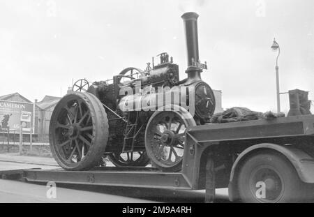 At a traction engine rally outside the Museum of Science and Technology on Newhall Street, Birmingham:- Loaded on the flat bed trailer for the trip home is Marshall General Purpose Engine, regn. E 9624, number 78085, Henry. Built in 1924 by Marshall, Sons & Co., with a 7 Nhp single-cylinder steam engine. Stock Photo