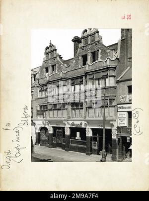Photograph of Angel PH, Ilford (Old), Essex. The main side of the print (shown here) depicts: Right face on view of the pub.  The back of the print (available on request) details: Trading Record 1927 . 1961 for the Angel, Ilford (Old), Essex IG1 1DE. As of July 2018 . Old building now Bonmarche Stock Photo