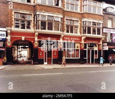 Photograph of Angel PH, Ilford (Old), Essex. The main side of the print (shown here) depicts: Colur Face on view of the pub.  The back of the print (available on request) details: Text re the Angel, Ilford for the Angel, Ilford (Old), Essex IG1 1DE. As of July 2018 . Old building now Bonmarche Stock Photo