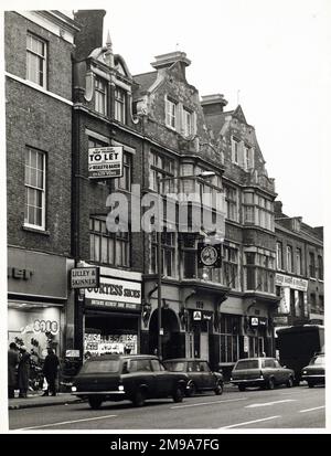 Photograph of Angel PH, Ilford (Old), Essex. The main side of the print (shown here) depicts: Left Face on view of the pub.  The back of the print (available on request) details: Photographer ID for the Angel, Ilford (Old), Essex IG1 1DE. As of July 2018 . Old building now Bonmarche Stock Photo