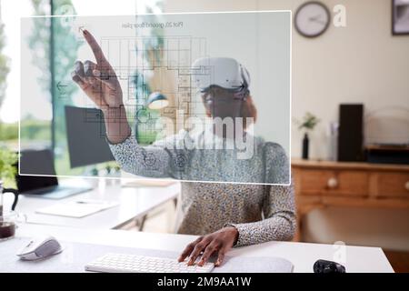 Female Architect At Home Office Wearing VR Headset Using AR Technology Interacting With Floor Plan Stock Photo