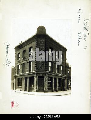 Photograph of Gowlett Arms, Peckham, London. The main side of the print (shown here) depicts: Corner on view of the pub.  The back of the print (available on request) details: Trading Record 1934 . 1961 for the Gowlett Arms, Peckham, London SE15 4HY. As of July 2018 . Punch Taverns Stock Photo