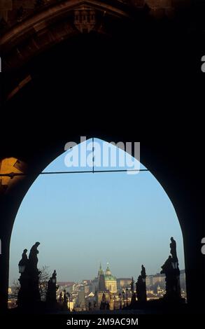 Czech Republic, Prague, looking across Charles bridge from one of the tower arches. Stock Photo