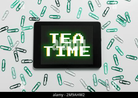 Conceptual caption Tea Time. Word Written on the time in the afternoon when some people eat a small meal Stock Photo
