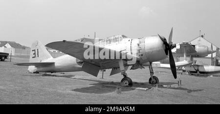 Mitsubishi A6M7 Reisen (msn 23186, allied reporting name Zeke), on display at Willow Grove Naval Air Station ca1957. This Mitsubishi A6M7 was built by Nakajima Hikoki as their 43rd Model 62 aircraft and was assigned to the Yokosuka Kokutai. After the war it was captured at Misawa, a testing facility operated by the First Naval Air Technical Bureau at Yokosuka Airfield and transported on USS Barnes (CVE-20) on 3 November 1945 along with other Japanese aircraft to the United States, where it was tested as FE-322 and later as T2-N322. After tests were completed it was displayed at Willow Grove Stock Photo