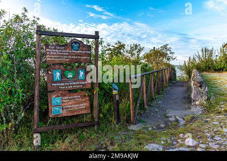 Ecuador - October 7, 2022: Cuicocha crater lake, trail markings in the national park Stock Photo