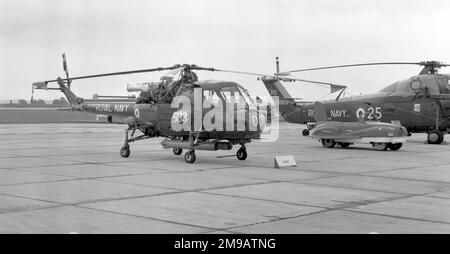 Royal Navy - Westland Wasp HAS.1 XT435 ' 503' of 829 Naval Air Squadron, with Wessex HAS.3 XS868 and a 'Batmobile', circa 1966. Stock Photo