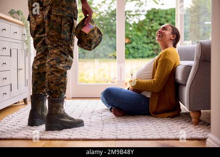 Couple With American Army Husband Home On Leave With Pregnant Wife Stock Photo