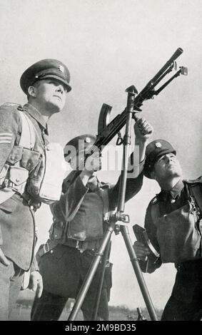 Army recruit learning to fire a machine gun, WW2 preparations Stock Photo