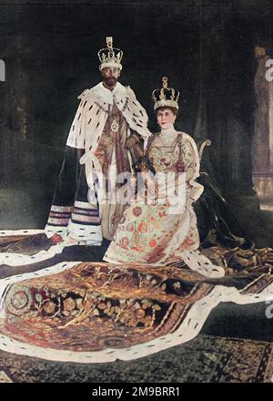 King George V (1865 - 1936), and Queen Mary in ceremonial robes.
