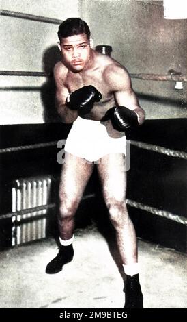 Joe Louis (1914 - 1981), American heavyweight boxer, pictured in 1936. Louis was one of the finest ever boxers, reigning as World Heavyweight between 1937 and 1950 and only losing three matches in his career. Stock Photo