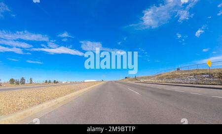 Driving on typical paved roads in suburban America. Stock Photo