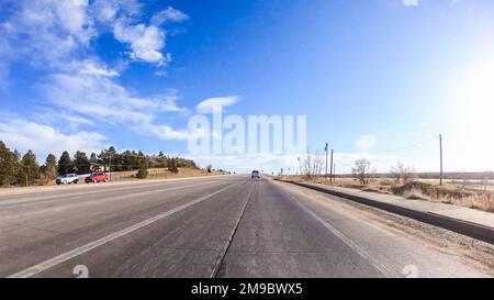 Driving on typical paved roads in suburban America. Stock Photo