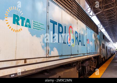 Miami, United States - November 15, 2022: Tri-Rail logo on a commuter rail train at Miami International Airport railway station in Florida, United Sta Stock Photo