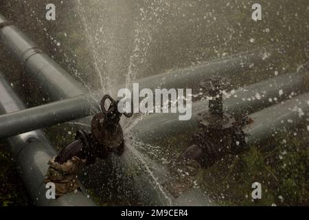 pipeline burst water pours from pipes industrial... Pipeline burst. Water pours from pipes. Industrial disaster. Damage ...