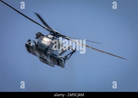 220516-N-PC065-1142   SKYROS ISLAND, Greece (May 16, 2022) – A U.S. Marine Corps CH-53E Super Stallion helicopter, assigned to Marine Medium Tiltrotor Squadron (VMM) 263 (Rein.), deployed with the San Antonio-class amphibious transport dock ship USS Arlington (LPD 24), flies near the coast of Skyros Island, Greece, during joint training with Hellenic Armed Forces, May 16, 2022. Arlington, with embarked 22nd Marine Expeditionary Unit, is participating in exercise Alexander the Great 2022 under the command and control of Task Force 61/2. Alexander the Great 22 strengthens interoperability and fo Stock Photo