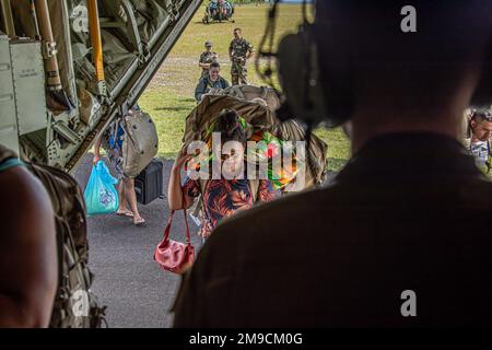 Soldiers from the Headquarter and Headquarters and Charlie Company, 100th Battalion, 442nd Infantry Regiment, U.S. Army Hawaii Reserve and French soldiers work together to evacuate locals on Huahine, French Polynesia, May 16, 2022. Marara 22 allows U.S. and partner forces to exercise humanitarian aid and disaster relief efforts and interoperability to prepare for and recover from the devastating effects of natural disasters. Stock Photo