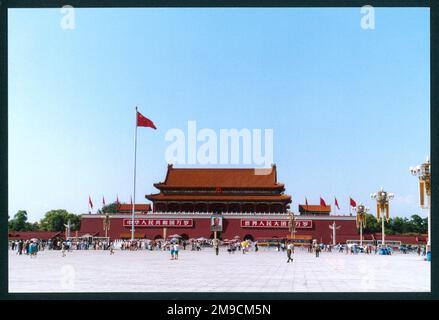 A view of Tiananmen Square, with the portrait of General Mao and the Chinese flag in the background. Stock Photo