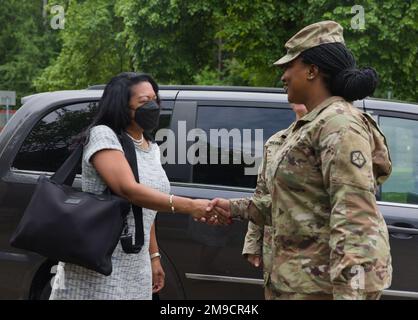 ANSBACH, Germany (May 17, 2022) - General Counsel of the Army, the Honorable Carrie F. Ricci, greets Staff Sgt. Mariah Clark, a V Corps Judge Advocate General’s Corps Soldier, at United States Army Garrison Ansbach – Barton Barracks, Germany, Monday, May 16, 2022, during her tour of V Corps and USAG Ansbach. V Corps works alongside NATO allies and regional security partners to provide combat ready forces, execute joint and multinational training exercises to improve interoperability, and ensure an appropriate collective posture of deterrence and defense. Stock Photo
