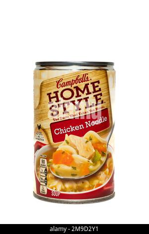 A can of Campbell's Home Style Chicken Noodle soup, a meal that just needs heating, isolated on white Stock Photo
