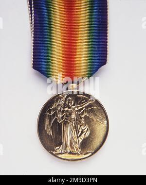 Victory Medal, 1914-19. The lacquered bronze medal, by W McMillan, commemorates the victory of the Allies over the Central Powers. On the obverse is Athene Nike, goddess of victory. On the reverse is inscribed the Great War for Civilisation. The recipient's name and service details are inscribed around the edge. (Obverse) Stock Photo