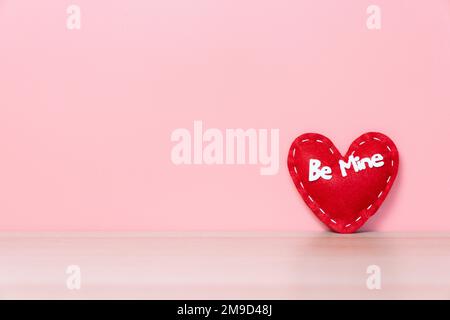 14 Feb, Valentine's day on blonde wooden background Stock Photo - Alamy