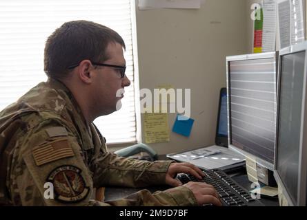 Senior Airman Dylan Buchheit, 4th Logistics Readiness Squadron material management journeyman, inputs received materials into a computer system at Seymour Johnson Air Force Base, North Carolina, May 17, 2022. Airmen assigned to the hazardous material shop are responsible to input correct data to ensure proper management and control of hazardous materials. 4th LRS,HAZMAT,Logistics Readiness Squadron,airmen, Stock Photo
