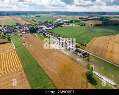 A drone shot of strips of farmland and meadows in Upper Silesia, Poland Stock Photo