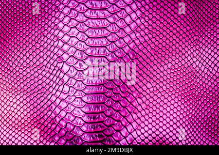 Abstract texture of imitation crocodile skin top view. Pink vertical  texture background. Reptile shiny textile, fabric design. Pink patent  bright croc Stock Photo - Alamy