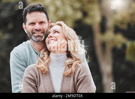 He makes me happy. an affectionate mature couple standing outside. Stock Photo