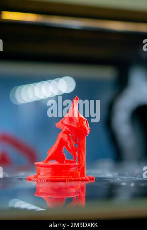 Model printed on a 3D printer from red plastic close-up. Stock Photo