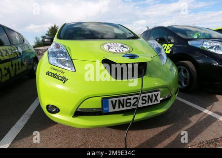 Undated file photo of a green car being charged. Demand for new green cars soared by nearly three-quarters last year amid a spike in sales of electric models. The Society of Motor Manufacturers and Traders (SMMT) said 31,220 new cars were registered in that colour in 2022. Issue date: Wednesday January 18, 2023. Stock Photo