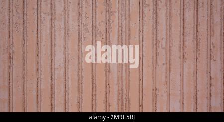 Light Pink red corrugated metal texture surface steel rusty wall metal vintage roller door background Stock Photo