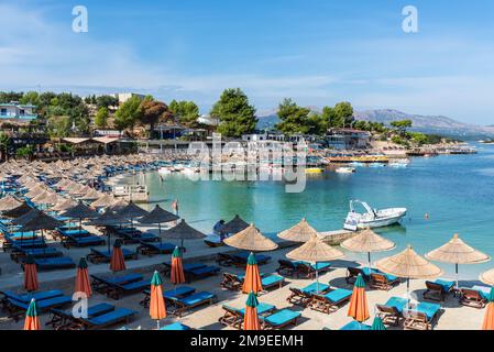 Ksamil, Albania - September 11, 2021: The Poda Beach in Ksamil, Albania, is a popular beach for people to relax. Vacation concept background. Stock Photo