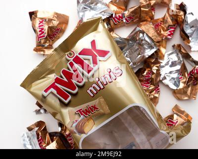 Twix minis cookie bars on white background.Twix is a chocolate bar made by Mars, Inc. Stock Photo