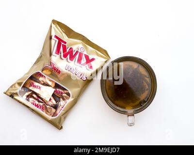 Twix minis cookie bars on white background.Twix is a chocolate bar made by Mars, Inc. Stock Photo