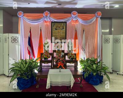 Bangkok, Thailand. 18th Jan, 2023. An altar to Princess Bajrakitiyabha is erected at the King Chulalongkorn Memorial Hospital in Bangkok. Next to her portrait is her orange royal flag. The 44-year-old had suddenly collapsed in mid-December 2022 and has been unconscious ever since. (to dpa: 'Orange flowers and prayers: Thailand fears for its princess') Credit: Carola Frentzen/dpa/Alamy Live News Stock Photo