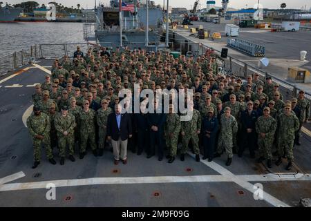 NAVAL STATION MAYPORT, Fla. (May 19, 2022) Secretary of the Navy Carlos Del Toro poses for a photo with the crew of the Arleigh Burke-class guided missile destroyer USS The Sullivans (DDG 68) during a base visit at Naval Station Mayport, May 19, 2022. Del Toro toured the Littoral Combat Ship Training Facility and Freedom-class littoral combat ship USS Little Rock (LCS 9) during his visit to Naval Station Mayport.  During his two-day trip to the Southeast region, Del Toro also visited USS The Sullivans (DDG 68) and U.S. Southern Command, where he met with Sailors, Marines and leadership.  U.S. Stock Photo