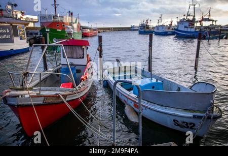 Sassnitz, Germany. 17th Jan, 2023. Fishing boats are moored in the fishing harbor. In the winter months, things are rather quiet at the jetties. Due to the low EU quotas for fish catches, many Baltic fishermen have given up and shut down their cutters. Credit: Jens Büttner/dpa/ZB/dpa/Alamy Live News Stock Photo