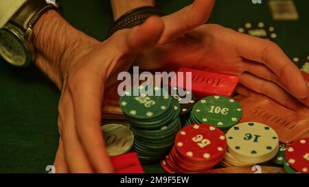 a-dramatic-moment-in-a-high-stakes-poker-game-as-all-the-chips-or-fiches-are-pushed-forward-signaling-an-all-in-bet-representing-the-high-stakes-2m9f5ew.jpg