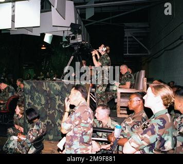 US Army SPECIALIST Soto shoots participants with a video during a theater/GCC (Ground Control Center) Update. This mission is in direct support of an Army Medical Department Exercise (AMEDDEX) Rock Drill Setup, at Fort Sam Houston, San Antonio, Texas on August 10th, 2000. Subject Operation/Series: AMEDDEX Base: Fort Sam Houston, San Antonio State: Texas (TX) Country: United States Of America (USA) Stock Photo