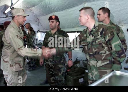 United States Ambassador to Kazakhstan, Mr. Richard Jones, meets members of the 82nd Airborne Division, 782nd Forward Surgical Team deployed from Fort Bragg North Carolina prior to an international mass jump. Paratroopers from Kazakhstan, the United States and Turkey are descending into Kazakhstan to prepare for the the start of CENTRASBAT 2000. The Central Asian Peacekeeping Battalion exercise CENTRASBAT 2000 is a multi-national peacekeeping and humanitarian relief exercise sponsored by U.S. CENTCOM and hosted by the former the Soviet Republic Kazakhstan in Central Asia. Exercise participants Stock Photo