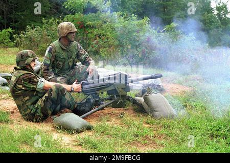 Richard Castanet, winner of the YAHOO.COM 'Be A Marine For A Week' contest, shoots grenades out of the MK-19 40mm Automatic Grenade launcher at Range 6 aboard Marine Corps Base Quantico, Virginia. Mr. Castanet did various tasks from shooting weapons to martial arts during his stay from September 12-18, 2000. Base: Marine Corps Base, Quantico State: Virginia (VA) Country: United States Of America (USA) Stock Photo