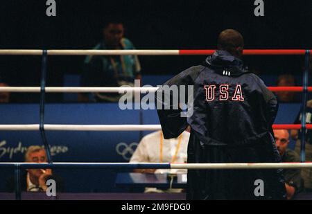 Rear view, medium shot of US Army STAFF Sergeant Olanda Anderson as he walks out of the ring following his 12-13 loss to Rudolf Kraj, of the Czech Republic, during the second round of Men's Boxing at the 2000 Olympics, on September 24th, 2000, in Sydney, Australia. SSG Anderson is from the US Army's World Class Athlete Program. Base: Sydney State: New South Wales Country: Australia (AUS) Stock Photo